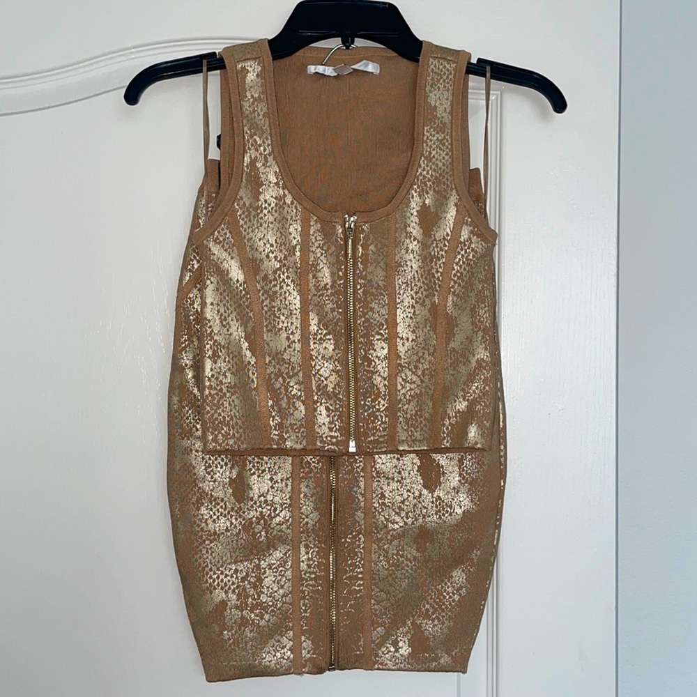 Size SMALL, GUESS skirt & top set. 84% rayon/viscose, 12% polyester, 4% spandex